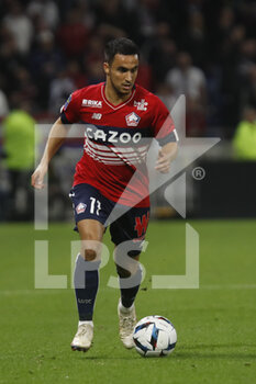 2022-10-30 - Adam OUNAS of Lille during the French championship Ligue 1 football match between Olympique Lyonnais (Lyon) and LOSC Lille on October 30, 2022 at Groupama stadium in Decines-Charpieu near Lyon, France - FOOTBALL - FRENCH CHAMP - LYON V LILLE - FRENCH LIGUE 1 - SOCCER