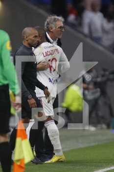 2022-10-30 - Alexandre LACAZETTE of Lyon and Laurent BLANC coach of Lyon during the French championship Ligue 1 football match between Olympique Lyonnais (Lyon) and LOSC Lille on October 30, 2022 at Groupama stadium in Decines-Charpieu near Lyon, France - FOOTBALL - FRENCH CHAMP - LYON V LILLE - FRENCH LIGUE 1 - SOCCER
