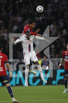 2022-10-30 - Karl TOKO EKAMBI of Lyon and Benjamin ANDRE of Lille during the French championship Ligue 1 football match between Olympique Lyonnais (Lyon) and LOSC Lille on October 30, 2022 at Groupama stadium in Decines-Charpieu near Lyon, France - FOOTBALL - FRENCH CHAMP - LYON V LILLE - FRENCH LIGUE 1 - SOCCER