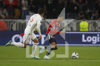 2022-10-30 - Akim ZEDADKA of Lille and Romain FAIVRE of Lyon during the French championship Ligue 1 football match between Olympique Lyonnais (Lyon) and LOSC Lille on October 30, 2022 at Groupama stadium in Decines-Charpieu near Lyon, France - FOOTBALL - FRENCH CHAMP - LYON V LILLE - FRENCH LIGUE 1 - SOCCER