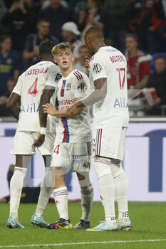 2022-10-30 - Johann LEPENANT of Lyon and Jerome BOATENG of Lyon during the French championship Ligue 1 football match between Olympique Lyonnais (Lyon) and LOSC Lille on October 30, 2022 at Groupama stadium in Decines-Charpieu near Lyon, France - FOOTBALL - FRENCH CHAMP - LYON V LILLE - FRENCH LIGUE 1 - SOCCER