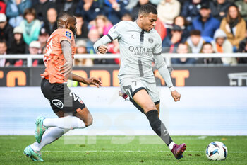 2022-11-06 - Gedeon KALULU of Lorient and Kylian MBAPPE of PSG during the French championship Ligue 1 football match between FC Lorient and Paris Saint-Germain on November 6, 2022 at the Moustoir stadium in Lorient, France - FOOTBALL - FRENCH CHAMP - LORIENT V PARIS SG - FRENCH LIGUE 1 - SOCCER