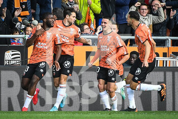2022-11-06 - Terem MOFFI of Lorient celebrate his goal with teammates during the French championship Ligue 1 football match between FC Lorient and Paris Saint-Germain on November 6, 2022 at the Moustoir stadium in Lorient, France - FOOTBALL - FRENCH CHAMP - LORIENT V PARIS SG - FRENCH LIGUE 1 - SOCCER
