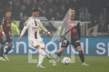 2022-11-11 - Houssem AOUAR of Lyon and Aaron RAMSEY of Nice during the French championship Ligue 1 football match between Olympique Lyonnais (Lyon) and OGC Nice on November 11, 2022 at Groupama stadium in Decines-Charpieu near Lyon, France - FOOTBALL - FRENCH CHAMP - LYON V NICE - FRENCH LIGUE 1 - SOCCER