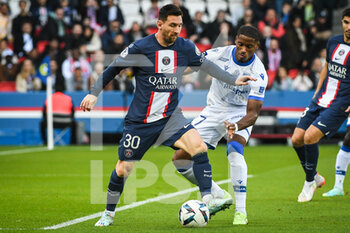 2022-11-13 - Lionel (Leo) MESSI of PSG and Julian JEANVIER of Auxerre during the French championship Ligue 1 football match between Paris Saint-Germain and AJ Auxerre on November 13, 2022 at Parc des Princes stadium in Paris, France - FOOTBALL - FRENCH CHAMP - PARIS SG V AUXERRE - FRENCH LIGUE 1 - SOCCER