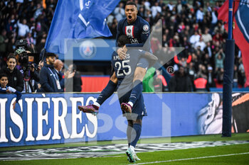 2022-11-13 - Kylian MBAPPE of PSG celebrate his goal with Nuno MENDES of PSG during the French championship Ligue 1 football match between Paris Saint-Germain and AJ Auxerre on November 13, 2022 at Parc des Princes stadium in Paris, France - FOOTBALL - FRENCH CHAMP - PARIS SG V AUXERRE - FRENCH LIGUE 1 - SOCCER