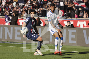 2022-11-13 - Jubal Rocha Mendes Jr of Auxerre, Carlos Soler of PSG (left) during the French championship Ligue 1 football match between Paris Saint-Germain and AJ Auxerre on November 13, 2022 at Parc des Princes stadium in Paris, France - FOOTBALL - FRENCH CHAMP - PARIS SG V AUXERRE - FRENCH LIGUE 1 - SOCCER