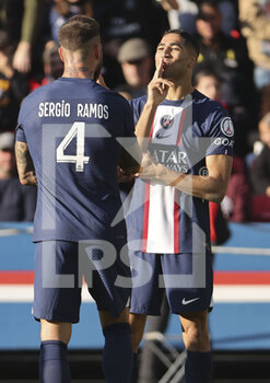 2022-11-13 - Achraf Hakimi of PSG celebrates his goal with Sergio Ramos during the French championship Ligue 1 football match between Paris Saint-Germain and AJ Auxerre on November 13, 2022 at Parc des Princes stadium in Paris, France - FOOTBALL - FRENCH CHAMP - PARIS SG V AUXERRE - FRENCH LIGUE 1 - SOCCER