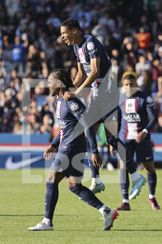 2022-11-13 - Renato Sanches of PSG celebrates his goal with Hugo Ekitike on his back during the French championship Ligue 1 football match between Paris Saint-Germain and AJ Auxerre on November 13, 2022 at Parc des Princes stadium in Paris, France - FOOTBALL - FRENCH CHAMP - PARIS SG V AUXERRE - FRENCH LIGUE 1 - SOCCER