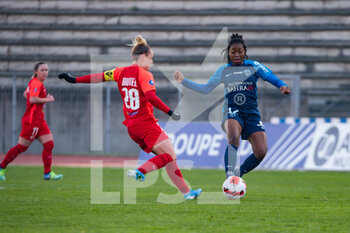 2022-01-15 - Gwenaelle Butel of GPSO 92 Issy and Oriane Jean Francois of Paris FC fight for the ball during the Women's French championship D1 Arkema football match between Paris FC and GPSO 92 Issy on January 15, 2022 at Robert Bobin stadium in Bondoufle, France - PARIS FC VS GPSO 92 ISSY - FRENCH WOMEN DIVISION 1 - SOCCER
