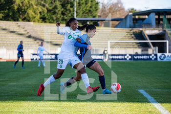 2022-02-05 - Kelly Gago of AS Saint Etienne and Clara Mateo of Paris FC fight for the ball during the Women's French championship D1 Arkema football match between Paris FC and AS Saint-Etienne on February 5, 2022 at Robert Bobin stadium in Bondoufle, France - PARIS FC VS AS SAINT-ETIENNE - FRENCH WOMEN DIVISION 1 - SOCCER
