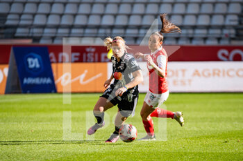 2022-02-27 - Eugenie Le Sommer of Olympique Lyonnais and Hana Kerner of Stade de Reims fight for the ball during the Women's French championship, D1 Arkema football match between Stade de Reims and Olympique Lyonnais (Lyon) on February 27, 2022 at Auguste Delaune stadium in Reims, France - STADE DE REIMS VS OLYMPIQUE LYONNAIS (LYON) - FRENCH WOMEN DIVISION 1 - SOCCER