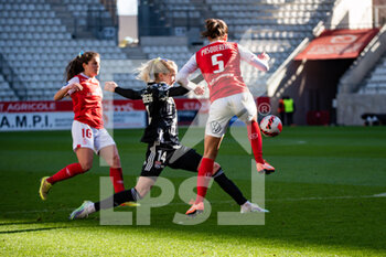2022-02-27 - Ada Hegerberg of Olympique Lyonnais and Julie Pasquereau of Stade de Reims during the Women's French championship, D1 Arkema football match between Stade de Reims and Olympique Lyonnais (Lyon) on February 27, 2022 at Auguste Delaune stadium in Reims, France - STADE DE REIMS VS OLYMPIQUE LYONNAIS (LYON) - FRENCH WOMEN DIVISION 1 - SOCCER