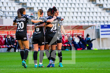 2022-02-27 - Melvine Malard of Olympique Lyonnais celebrates after scoring with teammates during the Women's French championship, D1 Arkema football match between Stade de Reims and Olympique Lyonnais (Lyon) on February 27, 2022 at Auguste Delaune stadium in Reims, France - STADE DE REIMS VS OLYMPIQUE LYONNAIS (LYON) - FRENCH WOMEN DIVISION 1 - SOCCER