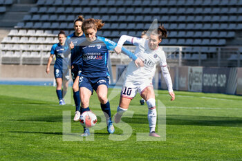 2022-04-03 - Daphne Corboz of Paris FC and Ramona Bachmann of Paris Saint Germain fight for the ball during the Women's French championship, D1 Arkema football match between Paris FC and Paris Saint-Germain on April 3, 2022 at Sebastien Charlety stadium in Paris, France - PARIS FC VS PARIS SAINT-GERMAIN - FRENCH WOMEN DIVISION 1 - SOCCER