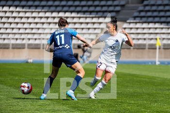 2022-04-03 - Clara Mateo of Paris FC and Sakina Karchaoui of Paris Saint Germain fight for the ball during the Women's French championship, D1 Arkema football match between Paris FC and Paris Saint-Germain on April 3, 2022 at Sebastien Charlety stadium in Paris, France - PARIS FC VS PARIS SAINT-GERMAIN - FRENCH WOMEN DIVISION 1 - SOCCER
