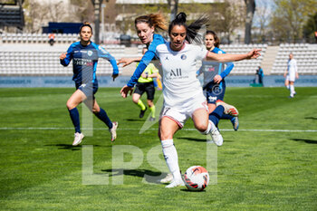 2022-04-03 - Anaig Butel of Paris FC and Sakina Karchaoui of Paris Saint Germain fight for the ball during the Women's French championship, D1 Arkema football match between Paris FC and Paris Saint-Germain on April 3, 2022 at Sebastien Charlety stadium in Paris, France - PARIS FC VS PARIS SAINT-GERMAIN - FRENCH WOMEN DIVISION 1 - SOCCER