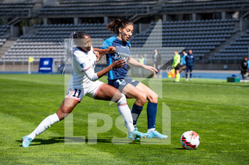 2022-04-03 - Kadidiatou Diani of Paris Saint Germain and Clara Mateo of Paris FC fight for the ball during the Women's French championship, D1 Arkema football match between Paris FC and Paris Saint-Germain on April 3, 2022 at Sebastien Charlety stadium in Paris, France - PARIS FC VS PARIS SAINT-GERMAIN - FRENCH WOMEN DIVISION 1 - SOCCER