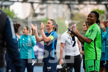 2022-04-15 - Gaetane Thiney of Paris FC celebrates the victory after the Women's French championship D1 Arkema football match between Paris FC and Montpellier HSC on April 15, 2022 at Charlety stadium in Paris, France - PARIS FC VS MONTPELLIER HSC - FRENCH WOMEN DIVISION 1 - SOCCER