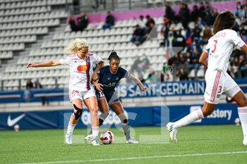 2022-05-29 - Lindsey Horan of OL and Ashley Lawrence of PSG during the Women's French championship, D1 Arkema football match between Paris Saint-Germain (PSG) and Olympique Lyonnais (Lyon, OL) on May 29, 2022 at Jean Bouin stadium in Paris, France - FOOTBALL - WOMEN'S FRENCH CHAMP - PARIS SG V OLYMPIQUE LYONNAIS - FRENCH WOMEN DIVISION 1 - SOCCER