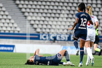 2022-05-29 - Sakina Karchaoui of PSG collapses on the floor after an injury during the Women's French championship, D1 Arkema football match between Paris Saint-Germain (PSG) and Olympique Lyonnais (Lyon, OL) on May 29, 2022 at Jean Bouin stadium in Paris, France - FOOTBALL - WOMEN'S FRENCH CHAMP - PARIS SG V OLYMPIQUE LYONNAIS - FRENCH WOMEN DIVISION 1 - SOCCER
