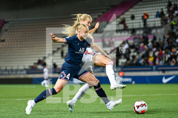 2022-05-29 - Ada Hegerberg of OL fights for the ball with Paulina Dudek of PSG during the Women's French championship, D1 Arkema football match between Paris Saint-Germain (PSG) and Olympique Lyonnais (Lyon, OL) on May 29, 2022 at Jean Bouin stadium in Paris, France - FOOTBALL - WOMEN'S FRENCH CHAMP - PARIS SG V OLYMPIQUE LYONNAIS - FRENCH WOMEN DIVISION 1 - SOCCER