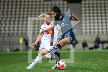 2022-05-29 - Amandine Henry of OL fights for the ball with Sakina Karchaoui of PSG during the Women's French championship, D1 Arkema football match between Paris Saint-Germain (PSG) and Olympique Lyonnais (Lyon, OL) on May 29, 2022 at Jean Bouin stadium in Paris, France - FOOTBALL - WOMEN'S FRENCH CHAMP - PARIS SG V OLYMPIQUE LYONNAIS - FRENCH WOMEN DIVISION 1 - SOCCER