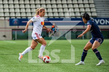2022-05-29 - Eugenie Le Sommer of Olympique Lyonnais and Sakina Karchaoui of Paris Saint Germain fight for the ball during the Women's French championship, D1 Arkema football match between Paris Saint-Germain and Olympique Lyonnais (Lyon) on May 29, 2022 at Jean Bouin stadium in Paris, France - FOOTBALL - WOMEN'S FRENCH CHAMP - PARIS SG V OLYMPIQUE LYONNAIS - FRENCH WOMEN DIVISION 1 - SOCCER
