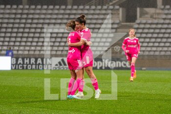 2022-10-14 - Mathilde Bourdieu of Paris FC celebrates with Tess Laplacette of Paris FC after scoring second goal during the Women's French championship D1 Arkema football match between Paris FC and Stade de Reims on October 14, 2022 at Charlety stadium in Paris, France - FOOTBALL - WOMEN'S FRENCH CHAMP - PARIS FC V STADE DE REIMS - FRENCH WOMEN DIVISION 1 - SOCCER