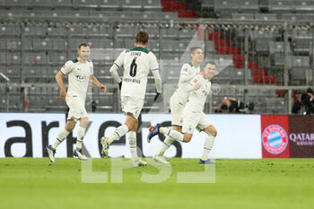 2022-01-07 - Stefan Lainer (18) of Moenchengladbach celebrates after his goal 1-2 during the German championship Bundesliga football match between Bayern Munich and Borussia Moenchengladbach on January 7, 2022 at Allianz Arena in Munich, Germany - BAYERN MUNICH VS BORUSSIA MOENCHENGLADBACH - GERMAN BUNDESLIGA - SOCCER