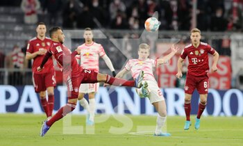 2022-02-05 - Corentin Tolisso of Bayern Munich and Dani Olmo of RB Leipzig during the German championship Bundesliga football match between Bayern Munich and RB Leipzig on February 5, 2022 at Allianz Arena in Munich, Germany - BAYERN MUNICH VS RB LEIPZIG - GERMAN BUNDESLIGA - SOCCER