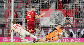2022-02-05 - Dani Olmo of RB Leipzig and Manuel Neuer of Bayern Munich during the German championship Bundesliga football match between Bayern Munich and RB Leipzig on February 5, 2022 at Allianz Arena in Munich, Germany - BAYERN MUNICH VS RB LEIPZIG - GERMAN BUNDESLIGA - SOCCER
