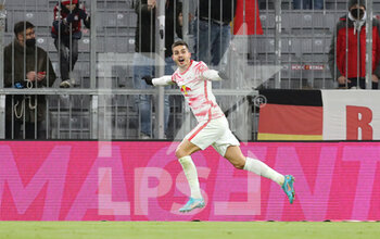 2022-02-05 - Andre Silva of RB Leipzig celebrates his goal 1-1 during the German championship Bundesliga football match between Bayern Munich and RB Leipzig on February 5, 2022 at Allianz Arena in Munich, Germany - BAYERN MUNICH VS RB LEIPZIG - GERMAN BUNDESLIGA - SOCCER