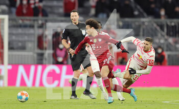 2022-02-05 - Leroy Sane of Bayern Munich and Andre Silva of RB Leipzig during the German championship Bundesliga football match between Bayern Munich and RB Leipzig on February 5, 2022 at Allianz Arena in Munich, Germany - BAYERN MUNICH VS RB LEIPZIG - GERMAN BUNDESLIGA - SOCCER
