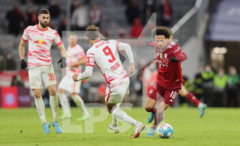 2022-02-05 - Leroy Sane of Bayern Munich and Yussuf Poulsen of RB Leipzig during the German championship Bundesliga football match between Bayern Munich and RB Leipzig on February 5, 2022 at Allianz Arena in Munich, Germany - BAYERN MUNICH VS RB LEIPZIG - GERMAN BUNDESLIGA - SOCCER