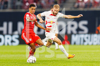 2022-07-30 - Jamal Musiala of Bayern Munich and Konrad Laimer of RB Leipzig during the German Super Cup football match between RB Leipzig and Bayern Munich on July 30, 2022 at Red Bull Arena in Leipzig, Germany - FOOTBALL - GERMAN SUPER CUP - RB LEIPZIG V BAYERN MUNICH - GERMAN SUPERCUP - SOCCER
