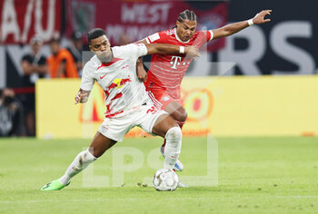 2022-07-30 - Benjamin Henrichs of RB Leipzig and Serge Gnabry of Bayern Munich during the German Super Cup football match between RB Leipzig and Bayern Munich on July 30, 2022 at Red Bull Arena in Leipzig, Germany - FOOTBALL - GERMAN SUPER CUP - RB LEIPZIG V BAYERN MUNICH - GERMAN SUPERCUP - SOCCER