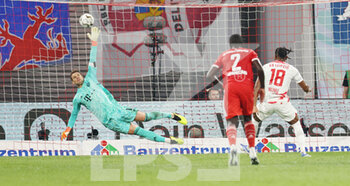 2022-07-30 - Christopher Nkunku of RB Leipzig scores a goal 2-4, Manuel Neuer of Bayern Munich during the German Super Cup football match between RB Leipzig and Bayern Munich on July 30, 2022 at Red Bull Arena in Leipzig, Germany - FOOTBALL - GERMAN SUPER CUP - RB LEIPZIG V BAYERN MUNICH - GERMAN SUPERCUP - SOCCER