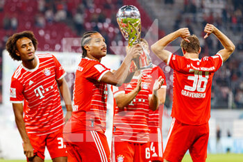 2022-07-30 - Serge Gnabry of Bayern Munich celebrates with the trophy during the German Super Cup football match between RB Leipzig and Bayern Munich on July 30, 2022 at Red Bull Arena in Leipzig, Germany - FOOTBALL - GERMAN SUPER CUP - RB LEIPZIG V BAYERN MUNICH - GERMAN SUPERCUP - SOCCER