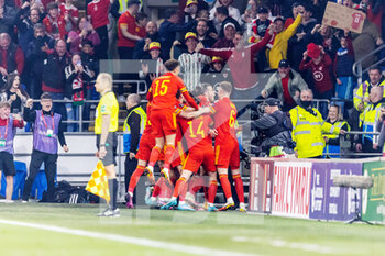 2022-03-24 - Wales? forward Gareth Bale (C) celebrates scoring his side's first goal 1-0 during the 2022 Fifa World Cup, Qualifiers Play-off, Semi Final football match between Wales and Austria on March 24, 2022 at the Cardiff City Stadium in Cardiff, Wales - 2022 FIFA WORLD CUP, QUALIFIERS PLAY-OFF, SEMI FINAL - WALES VS AUSTRIA - FIFA WORLD CUP - SOCCER