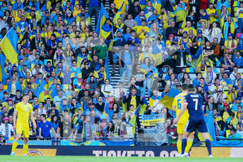 2022-06-01 - Ukraine fans during the FIFA World Cup 2022, Qualifiers Play-off football match between Scotland and Ukraine on June 1, 2022 at Hampden Park in Glasgow, Scotland - FOOTBALL - WORLD CUP 2022 - QUALIFIERS - PLAY OFF - SCOTLAND V UKRAINE - FIFA WORLD CUP - SOCCER