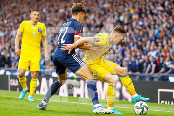 2022-06-01 - Viktor Tsygankov of Ukraine and Aaron Hickey of Scotland during the FIFA World Cup 2022, Qualifiers Play-off football match between Scotland and Ukraine on June 1, 2022 at Hampden Park in Glasgow, Scotland - FOOTBALL - WORLD CUP 2022 - QUALIFIERS - PLAY OFF - SCOTLAND V UKRAINE - FIFA WORLD CUP - SOCCER