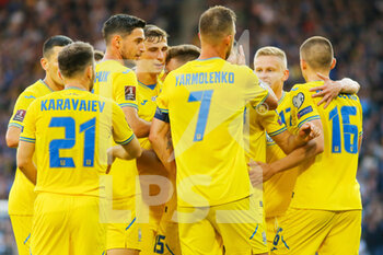 2022-06-01 - Andriy Yarmolenko of Ukraine celebrates after his goal with teammates 0-1 during the FIFA World Cup 2022, Qualifiers Play-off football match between Scotland and Ukraine on June 1, 2022 at Hampden Park in Glasgow, Scotland - FOOTBALL - WORLD CUP 2022 - QUALIFIERS - PLAY OFF - SCOTLAND V UKRAINE - FIFA WORLD CUP - SOCCER