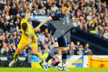 2022-06-01 - Scott McTominay of Scotland and Mykola Matvienko of Ukraine during the FIFA World Cup 2022, Qualifiers Play-off football match between Scotland and Ukraine on June 1, 2022 at Hampden Park in Glasgow, Scotland - FOOTBALL - WORLD CUP 2022 - QUALIFIERS - PLAY OFF - SCOTLAND V UKRAINE - FIFA WORLD CUP - SOCCER
