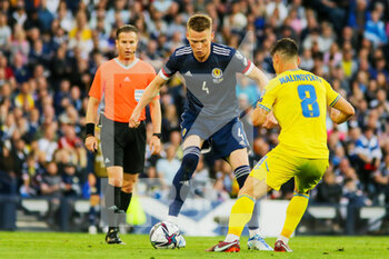 2022-06-01 - Scott McTominay of Scotland and Ruslan Malinovskyi of Ukraine during the FIFA World Cup 2022, Qualifiers Play-off football match between Scotland and Ukraine on June 1, 2022 at Hampden Park in Glasgow, Scotland - FOOTBALL - WORLD CUP 2022 - QUALIFIERS - PLAY OFF - SCOTLAND V UKRAINE - FIFA WORLD CUP - SOCCER