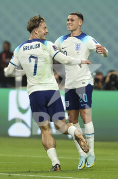 21/11/2022 - Jack Grealish of England celebrates his goal with Phil Foden during the FIFA World Cup 2022, Group B football match between England and Iran on November 21, 2022 at Khalifa International Stadium in Doha, Qatar - FOOTBALL - WORLD CUP 2022 - ENGLAND V IRAN - FIFA MONDIALI - CALCIO