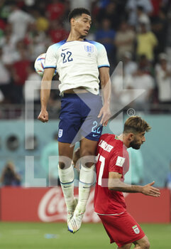 21/11/2022 - Jude Bellingham of England, Ali Gholizadeh of Iran (right) during the FIFA World Cup 2022, Group B football match between England and Iran on November 21, 2022 at Khalifa International Stadium in Doha, Qatar - FOOTBALL - WORLD CUP 2022 - ENGLAND V IRAN - FIFA MONDIALI - CALCIO