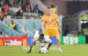 2022-11-21 - Matthijs de Ligt of Netherlands and Ismaila Sarr of Senegal during the FIFA World Cup 2022, Group A football match between Senegal and Netherlands on November 21, 2022 at Al Thumama Stadium in Doha, Qatar - FOOTBALL - WORLD CUP 2022 - SENEGAL V NETHERLANDS - FIFA WORLD CUP - SOCCER