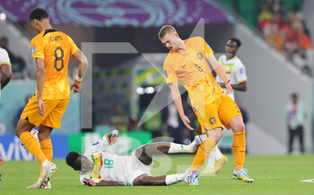 21/11/2022 - Matthijs de Ligt of Netherlands and Ismaila Sarr of Senegal during the FIFA World Cup 2022, Group A football match between Senegal and Netherlands on November 21, 2022 at Al Thumama Stadium in Doha, Qatar - FOOTBALL - WORLD CUP 2022 - SENEGAL V NETHERLANDS - FIFA MONDIALI - CALCIO