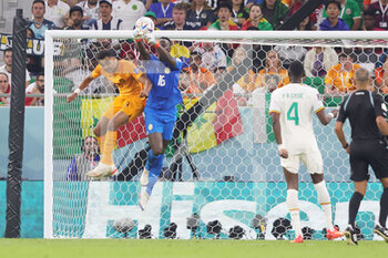 2022-11-21 - Cody Gakpo of Netherlands scores a goal 0-1, Edouard Mendy of Senegal during the FIFA World Cup 2022, Group A football match between Senegal and Netherlands on November 21, 2022 at Al Thumama Stadium in Doha, Qatar - FOOTBALL - WORLD CUP 2022 - SENEGAL V NETHERLANDS - FIFA WORLD CUP - SOCCER